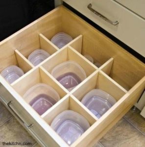 Food storage containers organized nicely in a kitchen drawer