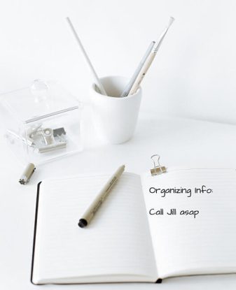 White desk with Call Jill (a professional organizer) ASAP on notepad