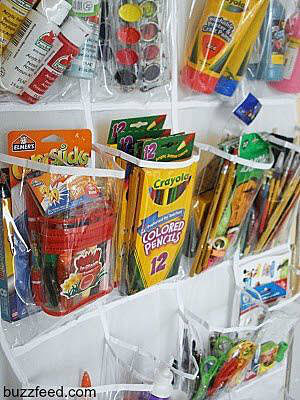 Art supplies in a repurposed over-the-door shoe organizer