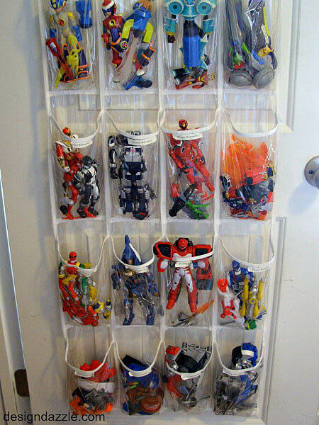 Children's toys in a clear repurposed shoe organizer